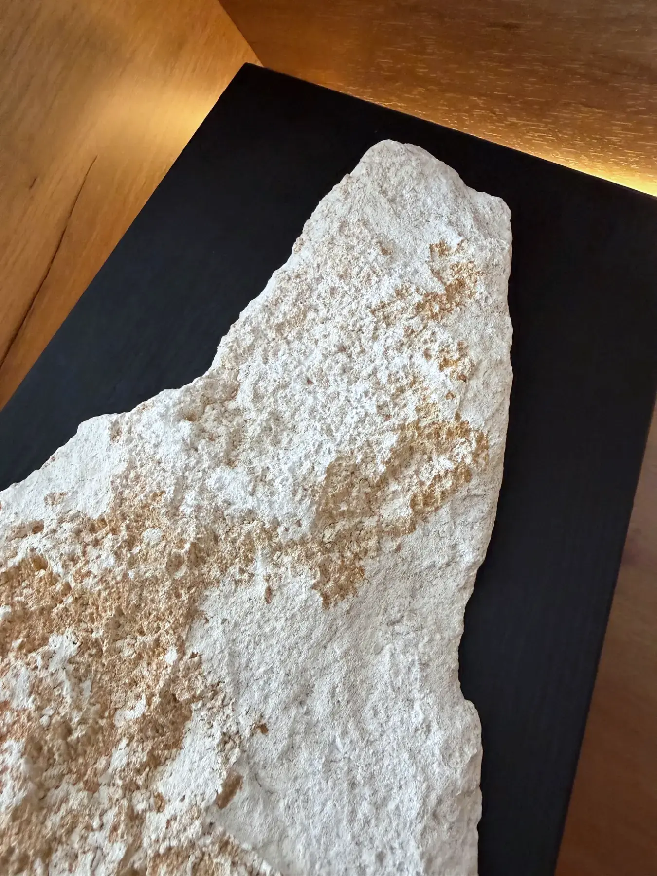 Natural Mallorcan stone sample in the EcoViva material wall