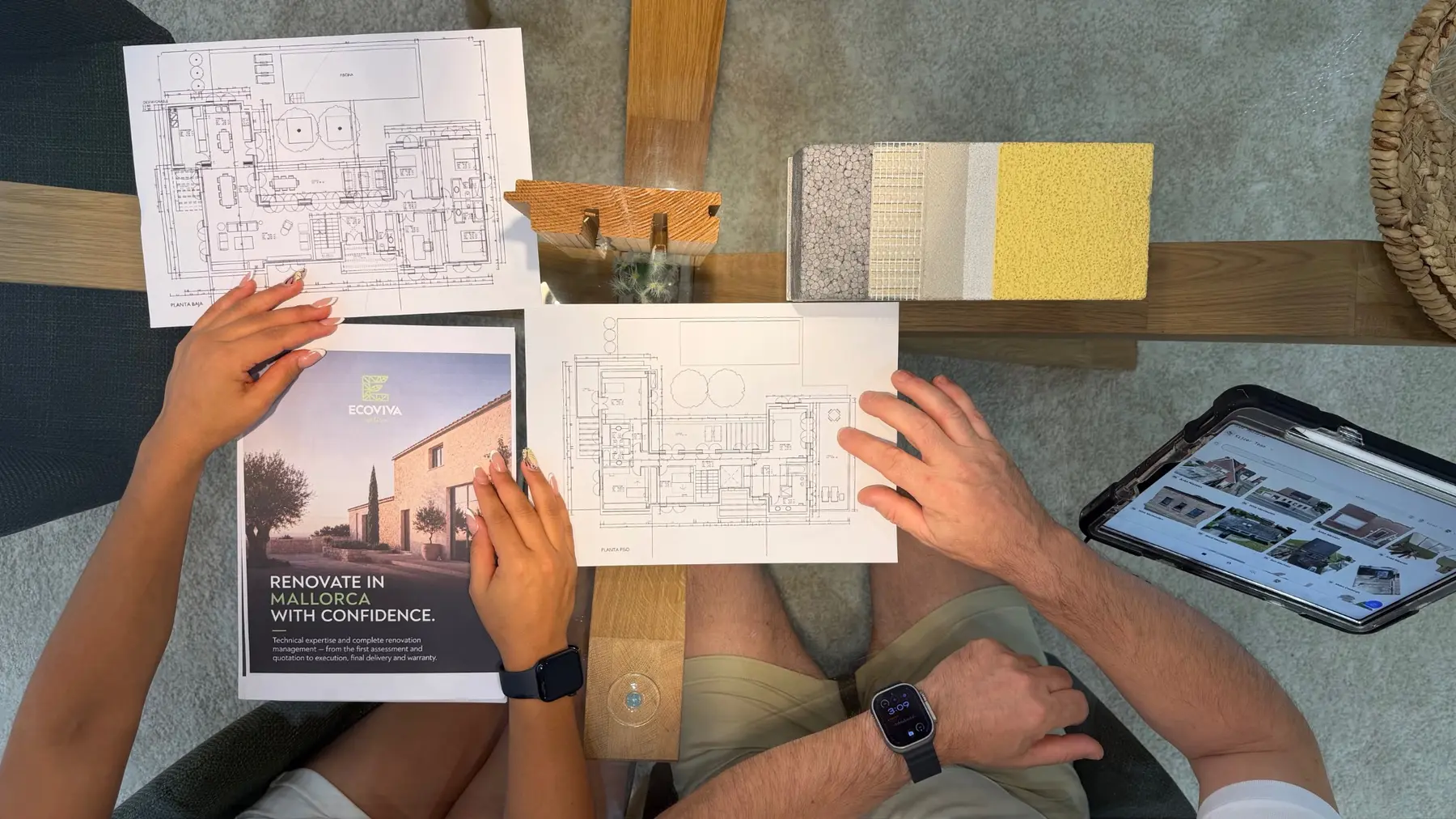 Renovation plans and technical system options reviewed together in the EcoViva studio